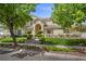 Charming two-story home with an immaculate lawn, mature trees, and inviting curb appeal at 7460 Grassy Field Ct, Las Vegas, NV 89131