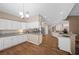 Well-lit kitchen with stainless steel appliances, ample counter space, and an open layout at 7460 Grassy Field Ct, Las Vegas, NV 89131