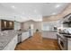 Bright kitchen with granite counters, stainless appliances, and ample space for cooking and entertaining at 7460 Grassy Field Ct, Las Vegas, NV 89131
