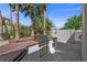 Outdoor kitchen with stainless steel grill, counter, and storage space, perfect for summer barbecues at 7460 Grassy Field Ct, Las Vegas, NV 89131