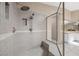 Spacious tiled shower featuring dual showerheads and a glass enclosure at 7460 Grassy Field Ct, Las Vegas, NV 89131