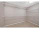 An organized walk-in closet with white wire shelving along three walls at 7460 Grassy Field Ct, Las Vegas, NV 89131