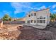 The backyard showcases a desert landscaped yard, brick lined patio, and exterior view at 7912 Painted Rock Ln, Las Vegas, NV 89149