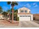 Charming two-story home featuring a well-manicured front yard and a two-car garage at 7912 Painted Rock Ln, Las Vegas, NV 89149