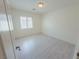 Standard bedroom with off-white walls, light wood floors and large window at 8223 Buffalo Ranch Ave, Las Vegas, NV 89147