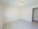 Clean bedroom featuring light gray flooring, white walls, modern light, and bright natural light at 8223 Buffalo Ranch Ave, Las Vegas, NV 89147