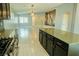 Open concept with kitchen island overlooking living area at 8223 Buffalo Ranch Ave, Las Vegas, NV 89147