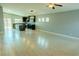 Bright, open floor plan with a spacious living area and a modern kitchen at 8223 Buffalo Ranch Ave, Las Vegas, NV 89147