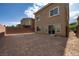 The backyard of the house has a large, empty lot at 8276 Sorrel St, Las Vegas, NV 89139