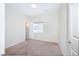 This cozy bedroom features neutral walls, carpet and a sunny window at 8276 Sorrel St, Las Vegas, NV 89139