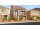 Beautiful home showcasing a red tile roof, balcony, two-car garage, and manicured landscaping at 8276 Sorrel St, Las Vegas, NV 89139