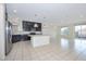 Spacious kitchen features dark cabinets and stainless steel appliances at 8276 Sorrel St, Las Vegas, NV 89139