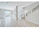 Bright, open living area with tile flooring, natural light, and access to outdoor space through sliding glass doors at 8276 Sorrel St, Las Vegas, NV 89139