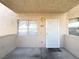 Inviting front door with decorative security screen and bright entry area at 8410 Eldora Ave # 1003, Las Vegas, NV 89117