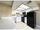 Modern kitchen features stainless appliances, bright lighting, and white cabinets at 8410 Eldora Ave # 1003, Las Vegas, NV 89117