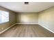 Spacious living room with neutral paint, new flooring, and natural light at 8410 Eldora Ave # 1003, Las Vegas, NV 89117