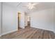Bedroom featuring wood-look floors and closet space at 844 Binbrook Dr, Henderson, NV 89052