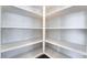 Spacious pantry with multiple shelves for organized storage of kitchen essentials at 844 Binbrook Dr, Henderson, NV 89052