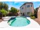 Backyard with a swimming pool, spa and patio perfect for outdoor living at 844 Binbrook Dr, Henderson, NV 89052