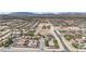 Wide aerial view of a residential community with well-maintained lawns, mature trees, and diverse architectural styles at 8945 S Tenaya Way, Las Vegas, NV 89113