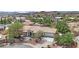 Aerial view of a well-maintained home featuring desert landscaping and a charming exterior at 8945 S Tenaya Way, Las Vegas, NV 89113