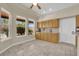 Bright dining area with granite counters and three windows at 8945 S Tenaya Way, Las Vegas, NV 89113