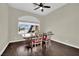Dining room with hardwood floors, natural light, and stylish furniture at 8945 S Tenaya Way, Las Vegas, NV 89113