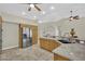 Beautiful kitchen featuring stainless steel appliances, granite countertops, and custom cabinets at 8945 S Tenaya Way, Las Vegas, NV 89113