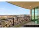 Balcony with decorative iron railing and views of the city skyline at 9101 Alta Dr # 706, Las Vegas, NV 89145