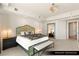 Spacious main bedroom with large windows, chandelier lighting, and a seating area at 9101 Alta Dr # 706, Las Vegas, NV 89145