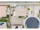 Bird's eye view of a backyard featuring a trampoline, basketball court, and low-maintenance landscaping at 9373 Oxbow Lake Ave, Las Vegas, NV 89149