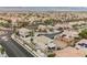 Drone shot showcasing the home's lot size, backyard features, and community layout at 9373 Oxbow Lake Ave, Las Vegas, NV 89149