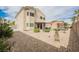Backyard with patio furniture, a trampoline, drought resistant landscaping, and rock ground cover at 9373 Oxbow Lake Ave, Las Vegas, NV 89149