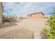 Large backyard with low maintenance landscaping and plenty of space for customization at 9373 Oxbow Lake Ave, Las Vegas, NV 89149