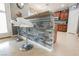 The kitchen bar features granite counters, stone accents, stainless steel appliances, and pendant lighting at 9373 Oxbow Lake Ave, Las Vegas, NV 89149