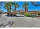 Expansive backyard boasting a pool, gazebo, lush landscaping, and stunning home at 9504 Empire Rock St, Las Vegas, NV 89143