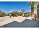 Spacious backyard features lounge seating and gazebo, perfect for outdoor relaxation and entertainment at 9504 Empire Rock St, Las Vegas, NV 89143