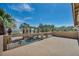 Balcony with views of the pool and palm trees offering a relaxing outdoor space for entertaining at 9504 Empire Rock St, Las Vegas, NV 89143