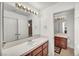 Well-lit bathroom featuring double sinks and vanity at 9504 Empire Rock St, Las Vegas, NV 89143