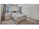 Bright bedroom with a comfortable bed, carpet, and windows for natural light at 9504 Empire Rock St, Las Vegas, NV 89143