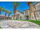Beautiful two-story home with desert landscaping and a three car garage at 9504 Empire Rock St, Las Vegas, NV 89143