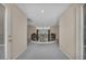 Elegant foyer featuring wrought iron railings and neutral decor, exuding a sense of sophistication at 9504 Empire Rock St, Las Vegas, NV 89143