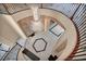 Elegant foyer with a grand chandelier and staircase, creating a stunning first impression at 9504 Empire Rock St, Las Vegas, NV 89143