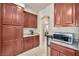 Well-lit kitchen showcasing custom cabinets and countertop space at 9504 Empire Rock St, Las Vegas, NV 89143