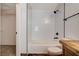 This bathroom features a shower and tub at 9655 Lame Horse Dr, Las Vegas, NV 89123