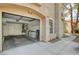 Exterior shot of garage, showing location, storage and washer and dryer at 9655 Lame Horse Dr, Las Vegas, NV 89123