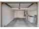 This garage has a cement floor and built in shelving at 9655 Lame Horse Dr, Las Vegas, NV 89123