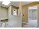 Hallway with two rooms and stairs that lead downstairs at 9655 Lame Horse Dr, Las Vegas, NV 89123
