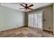Relaxing space with neutral colors, tile flooring, and a sliding glass door at 9655 Lame Horse Dr, Las Vegas, NV 89123