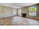 This living room features natural light and a fireplace at 9655 Lame Horse Dr, Las Vegas, NV 89123